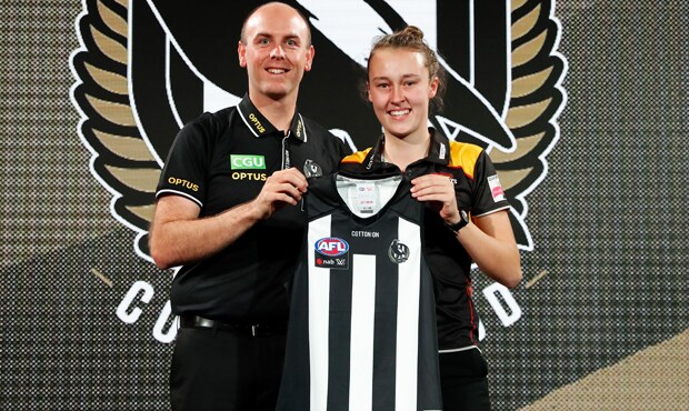 181023_allen620.png Coach Wayne Siekman presents Jordyn Allen with her Collingwood jumper after the club selected her with its first pick in the 2018 AFL Women's Draft. - Collingwood,Collingwood Magpies,AFLW